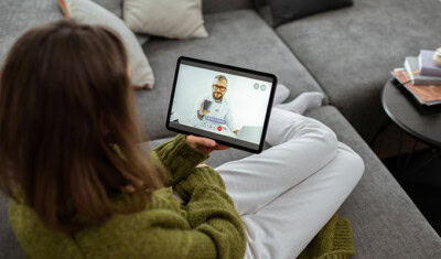 woman using teladoc