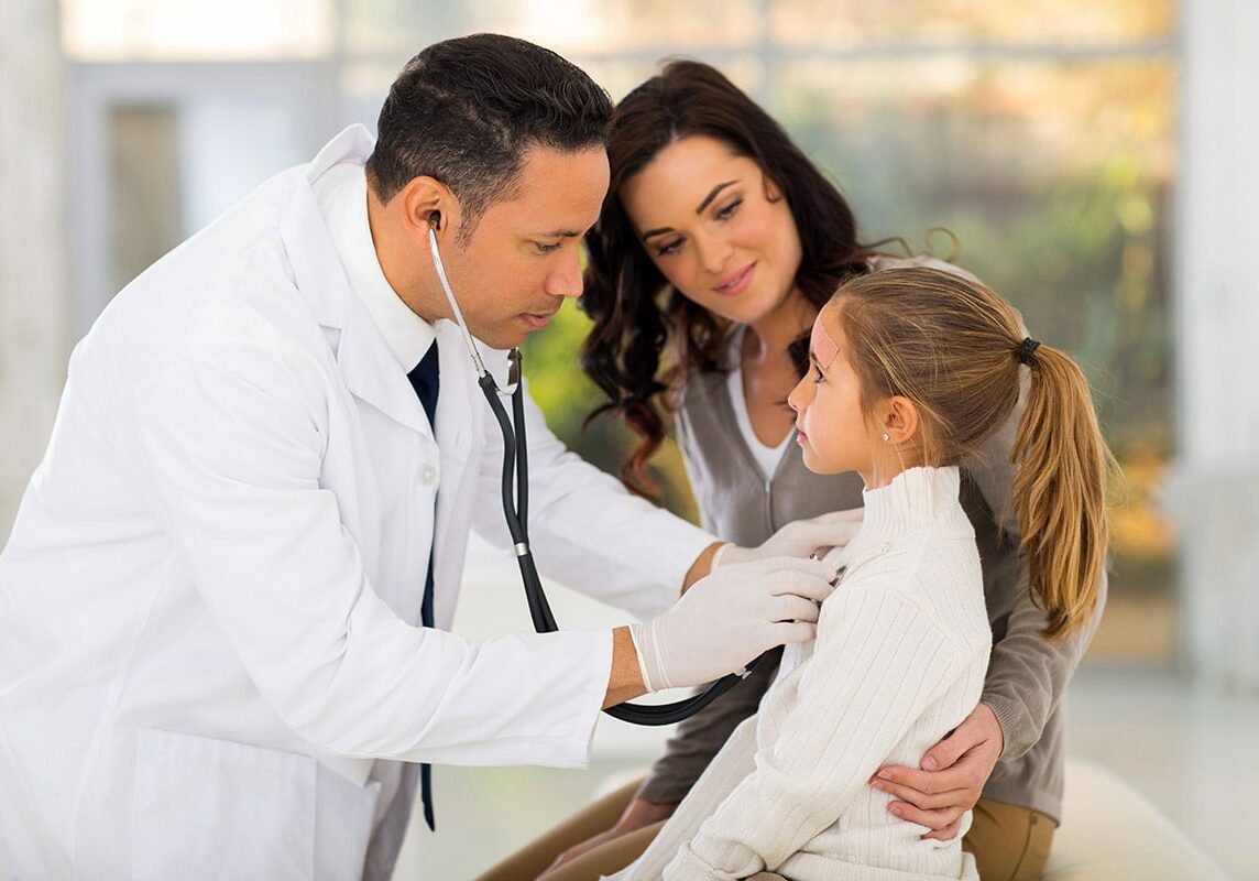mother and daughter with doctor